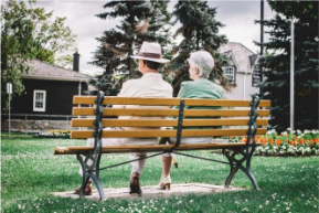 Couple on bench, aging in place